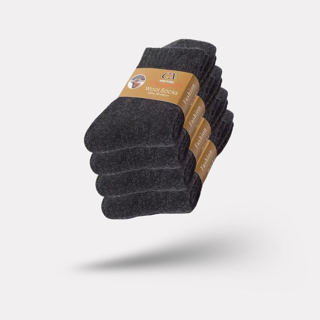 Thick merino wool winter socks in gray, black, khaki and brown, pulled up over the calf