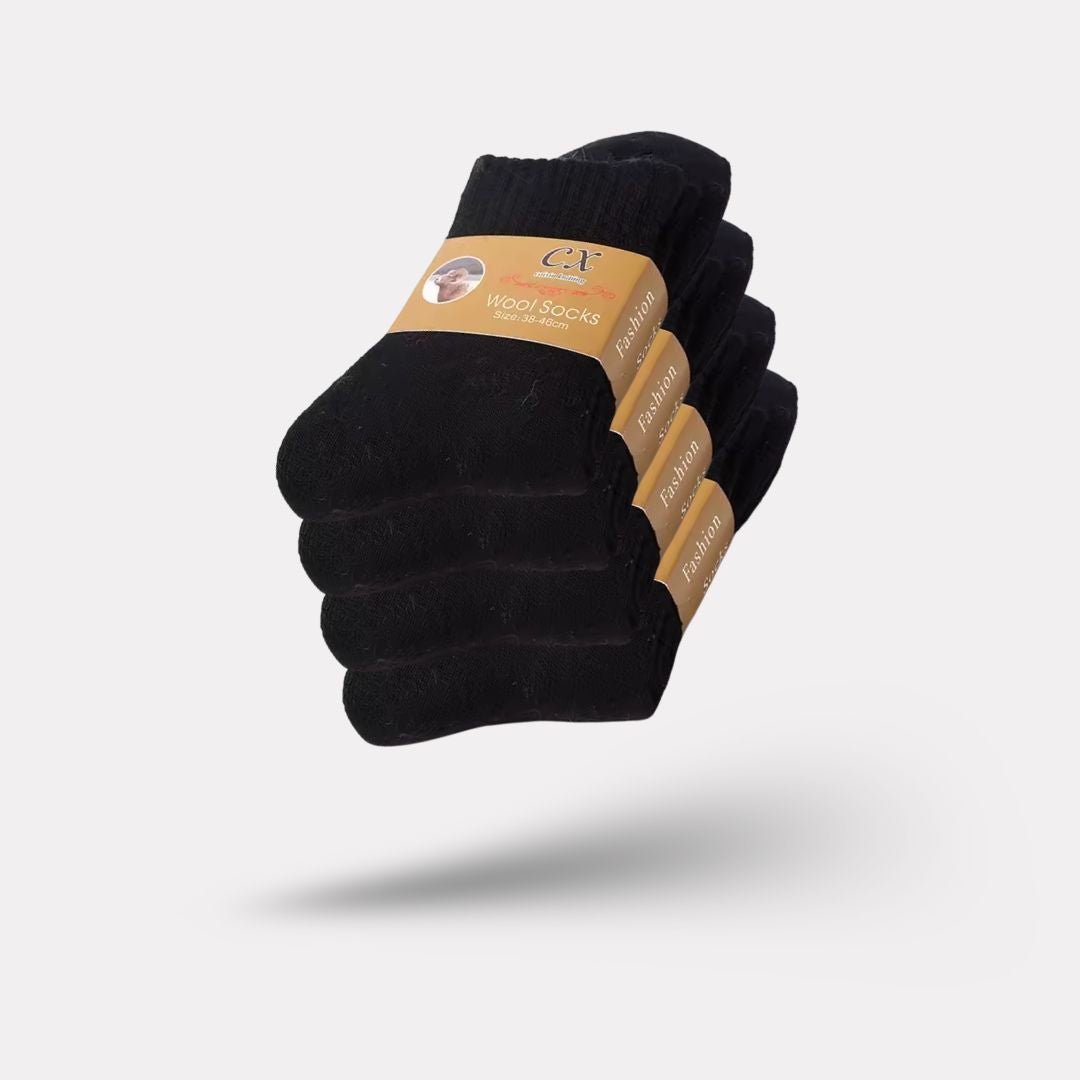 Thick merino wool winter socks in gray, black, khaki and brown, pulled up over the calf