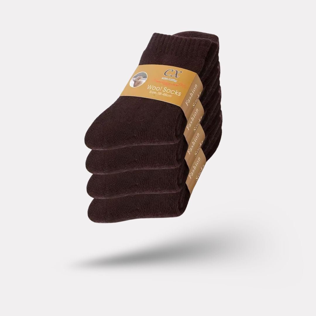 Thick merino wool winter socks in gray, black, khaki and brown, pulled up over the calf