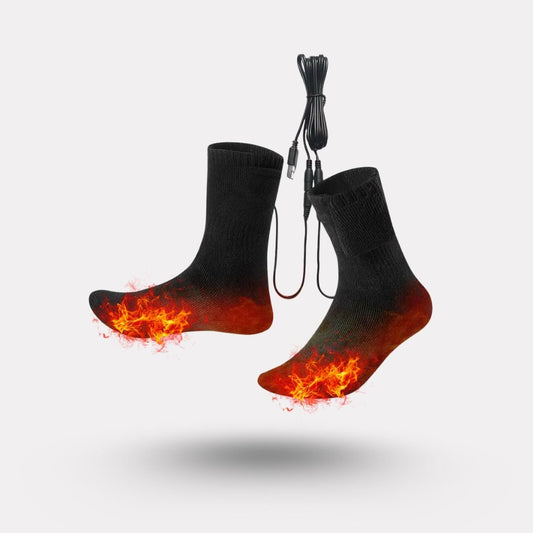 Rechargeable heated socks with a battery pack sitting at the top of the calf