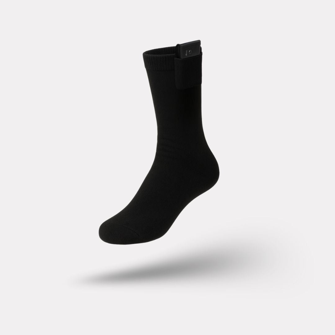 Rechargeable heated socks with a battery pack sitting at the top of the calf