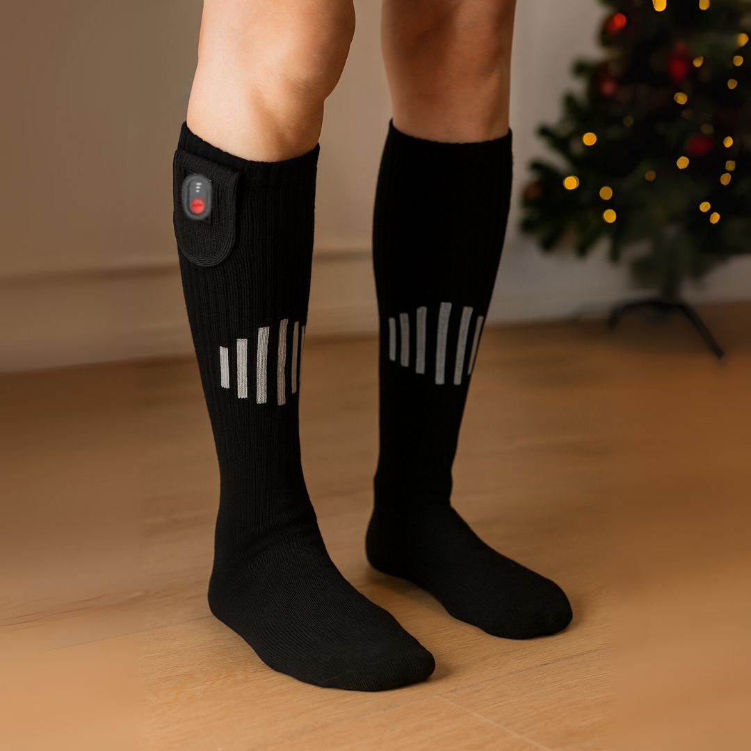 Heated sport socks with a battery pocket at the top of the calf