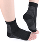 White and black anti-fatigue compression socks with flat seams, worn up the calf