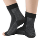 White and black anti-fatigue compression socks with flat seams, worn up the calf