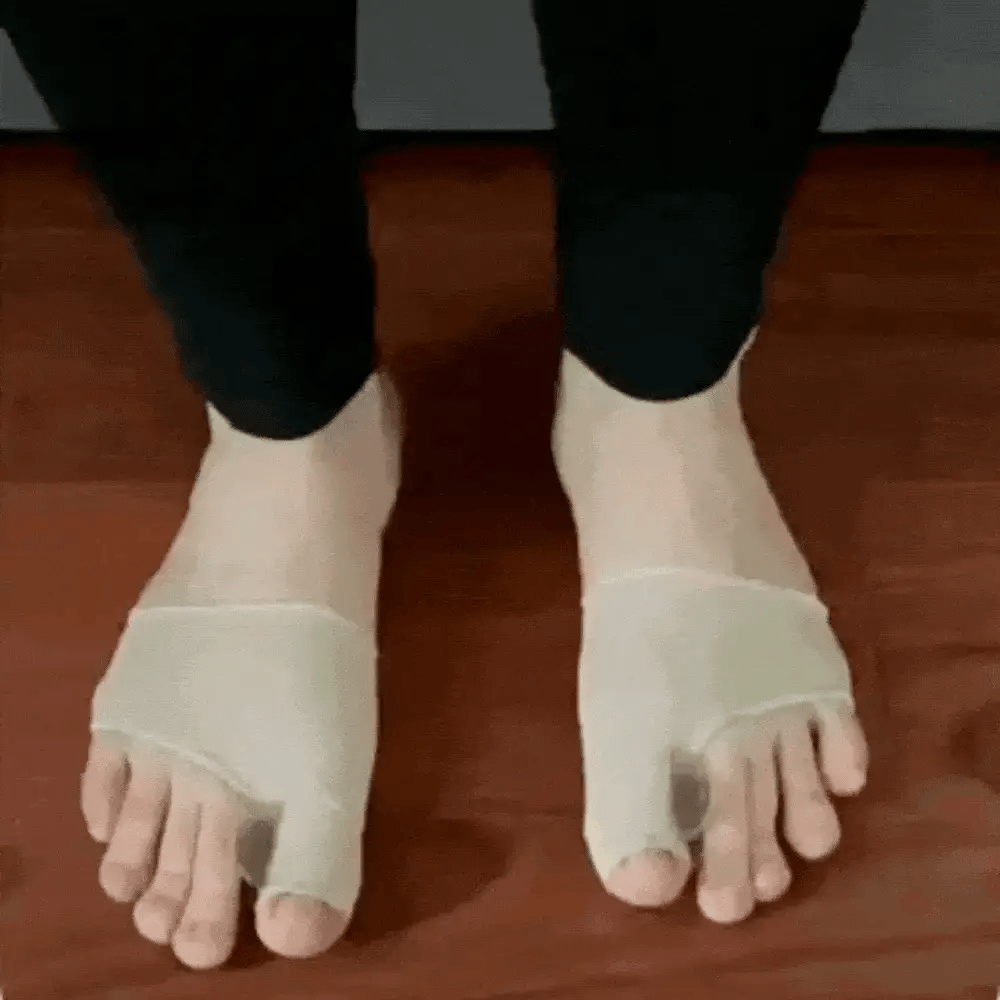 Bunion correction sock with separated toe loops, worn over the forefoot inside a shoe