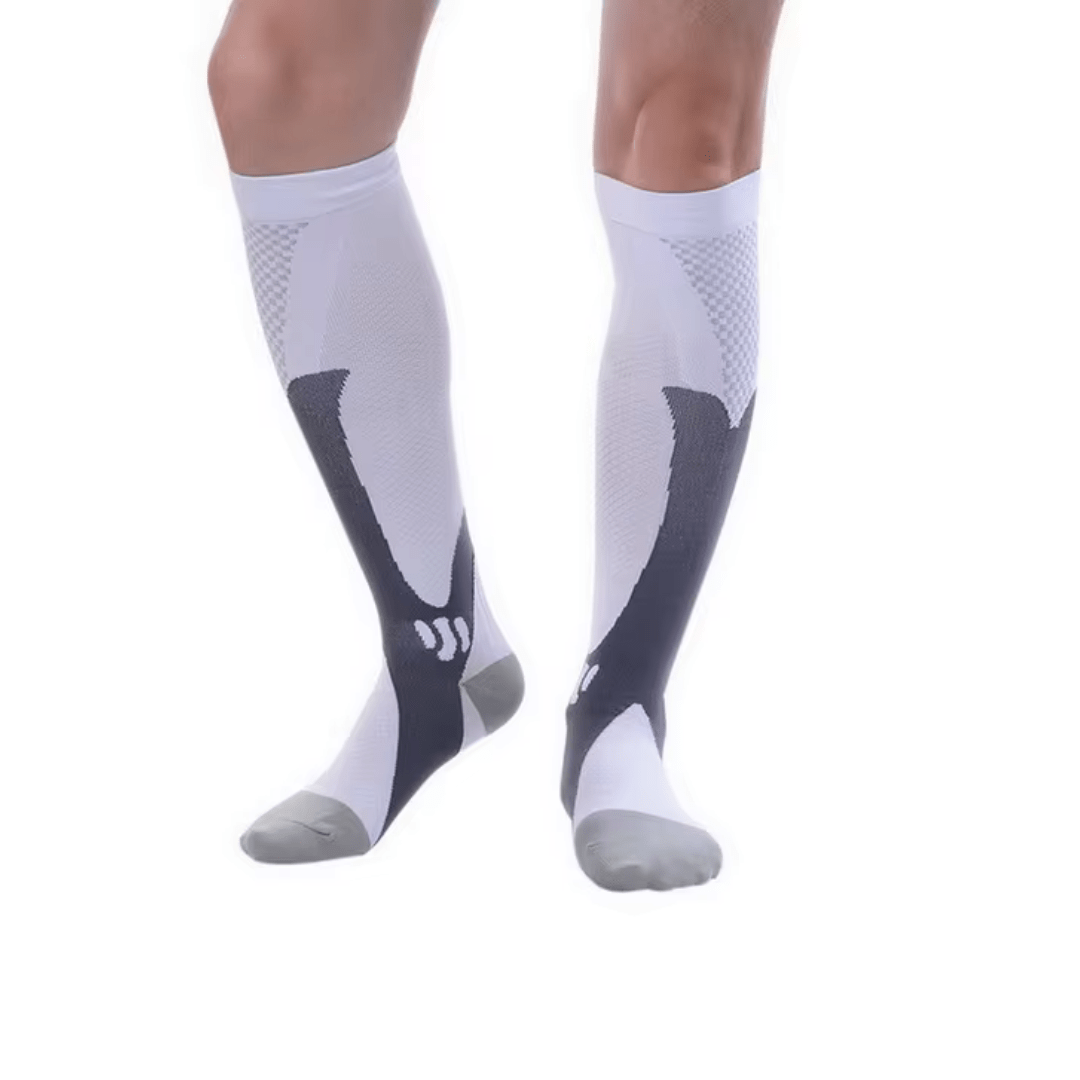 Black and white compression socks worn up the calf to support circulation