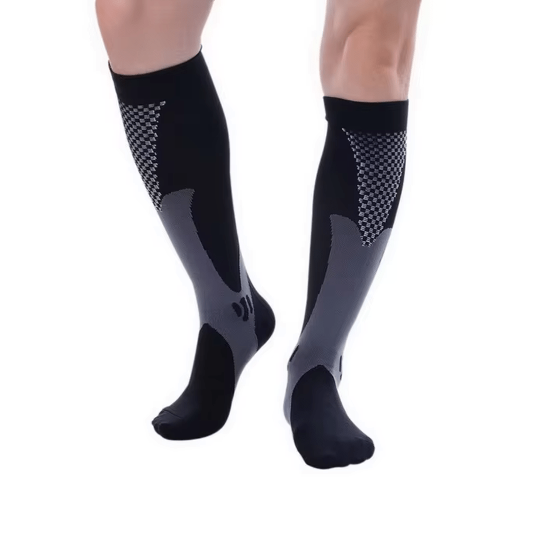Black and white compression socks worn up the calf to support circulation