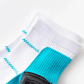 Knee-high compression socks with white panels along the calf, in blue, gray and black