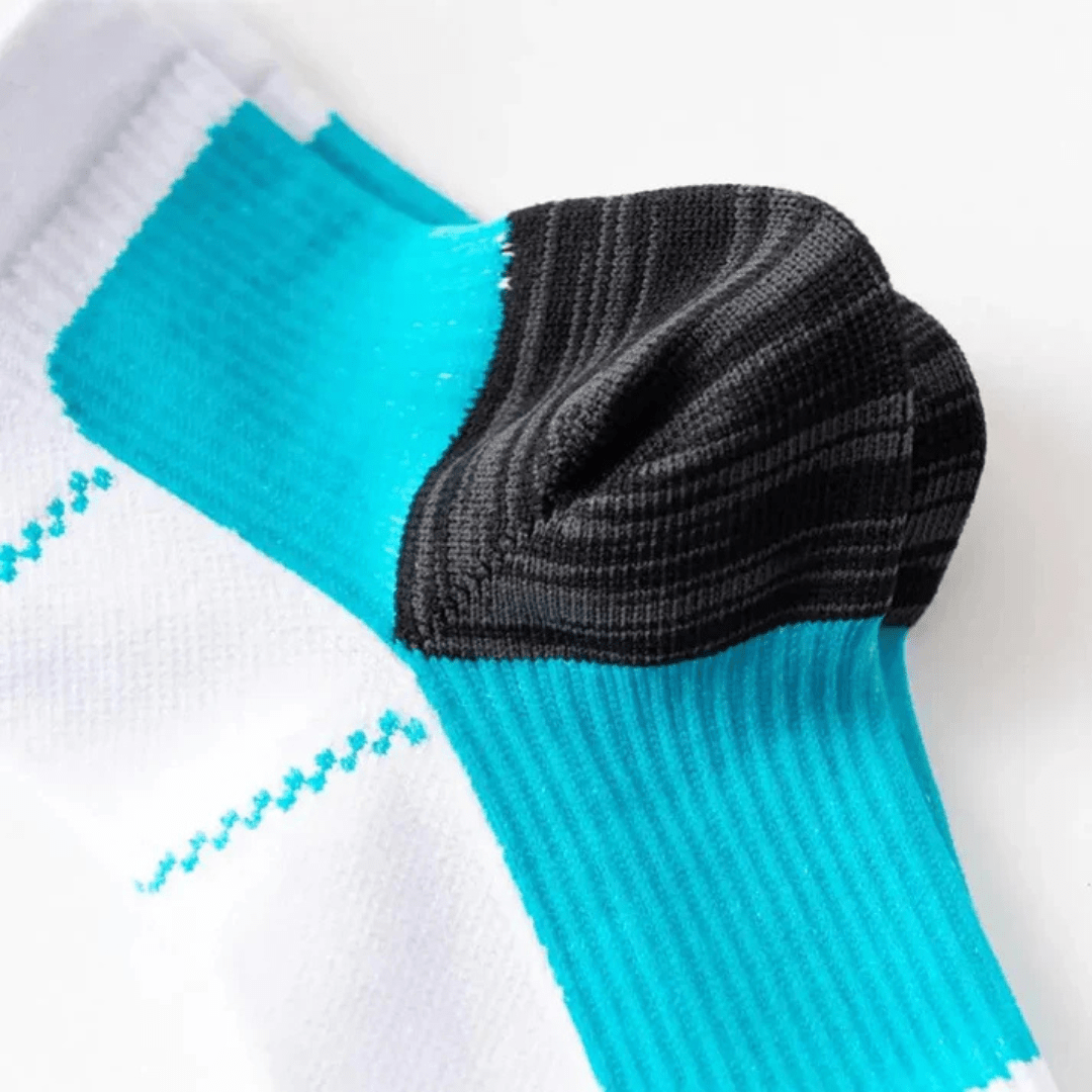 Soft compression socks for neuropathy, in blue and white, gray and white, and black and blue