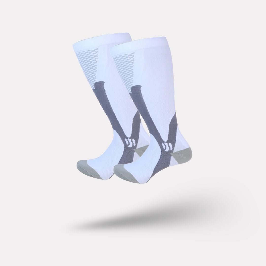 Plus size compression socks in 2XL to 4XL, worn up the calf, in black, white, gray or red