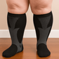 Plus size compression socks in 2XL to 4XL, worn up the calf, in black, white, gray or red