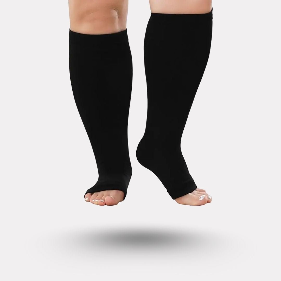 Open-toe compression socks in black and beige, knitted wide for fuller calves