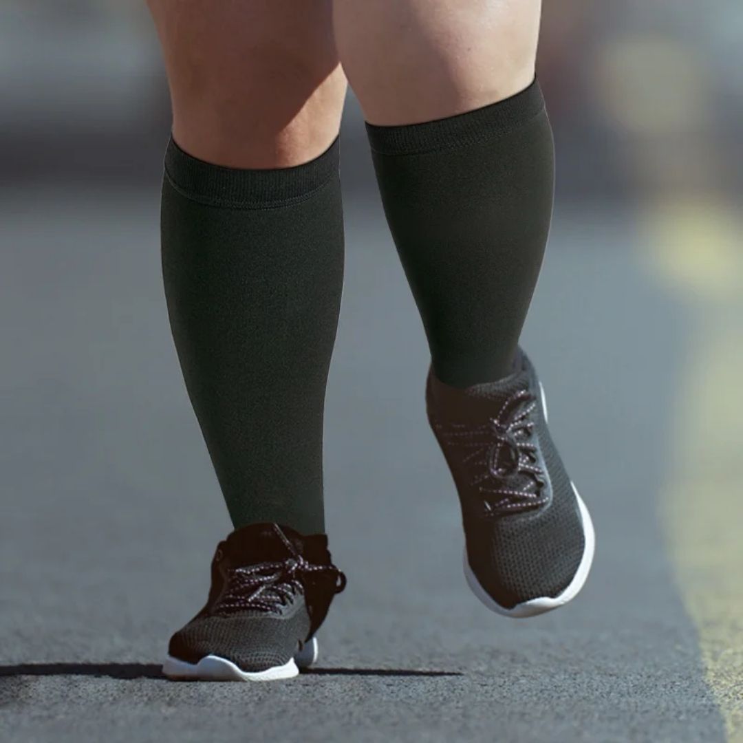 Open-toe compression socks in black and beige, knitted wide for fuller calves