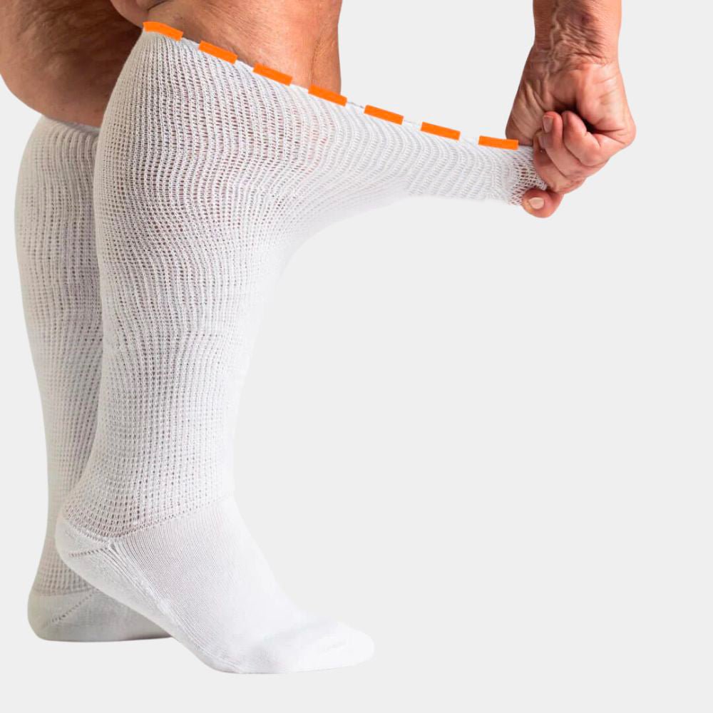 White seamless compression socks that stretch up the calf with no ridge at the toe