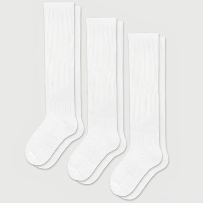 White seamless compression socks that stretch up the calf with no ridge at the toe