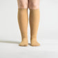 Beige seamless compression socks with a smooth toe and a stretchy calf