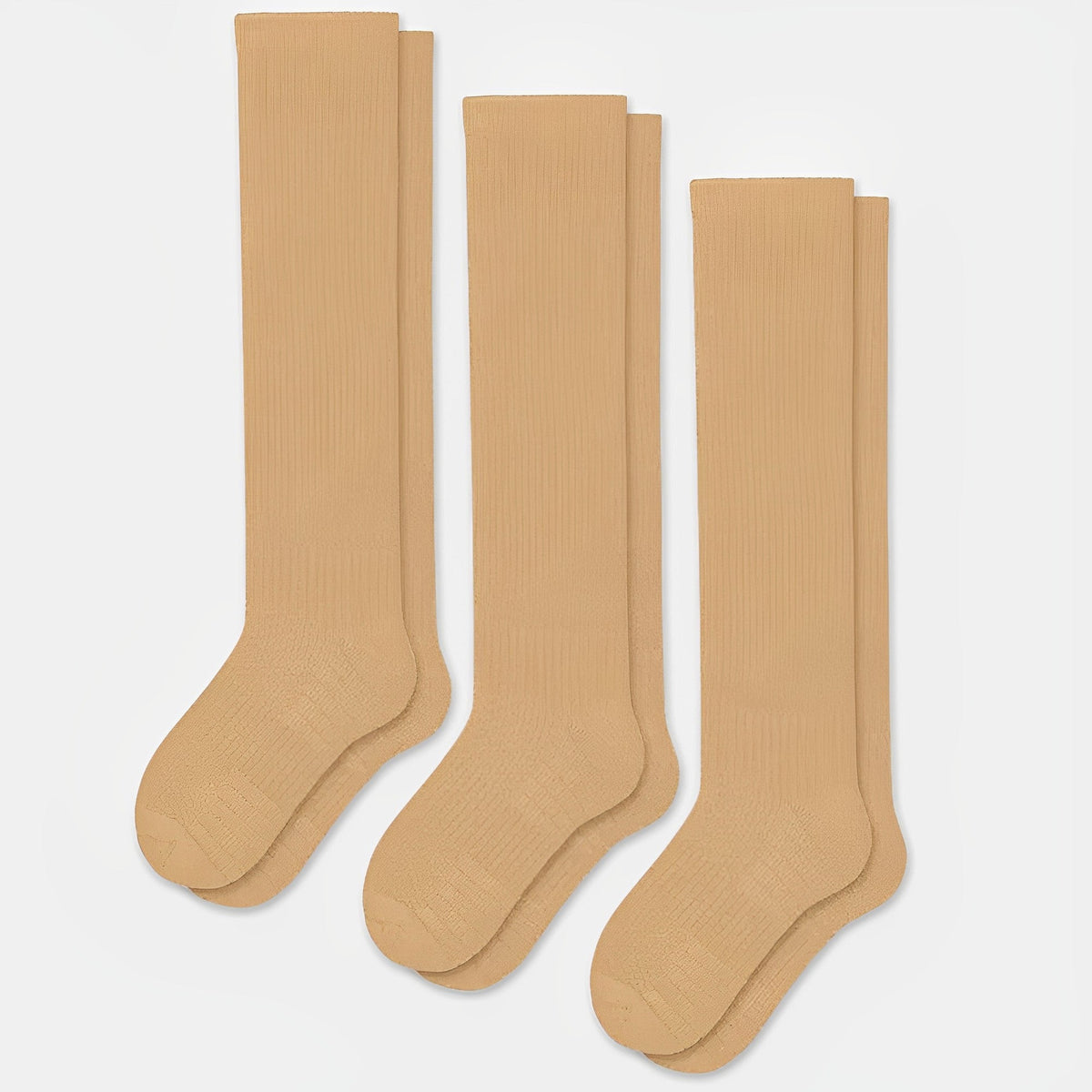 Beige seamless compression socks with a smooth toe and a stretchy calf