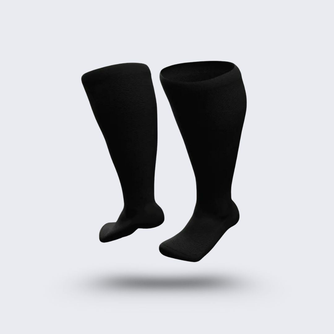 Black compression socks cut for wide calves with a graduated knit