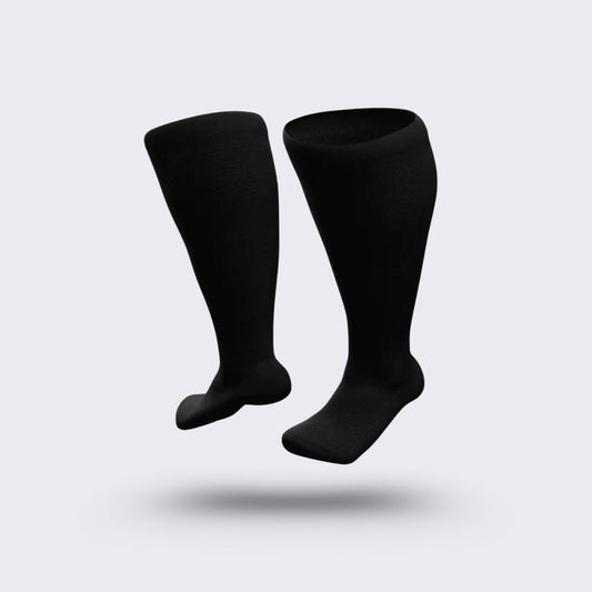 Black compression socks cut for wide calves with a graduated knit
