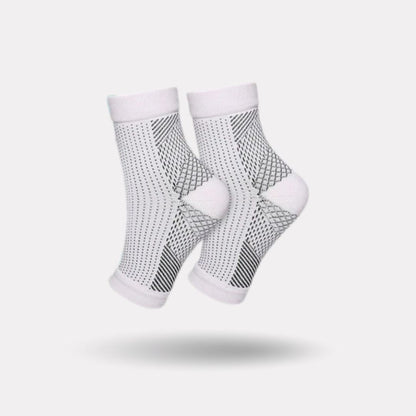 Knee-high therapeutic compression socks worn from the foot up to below the knee