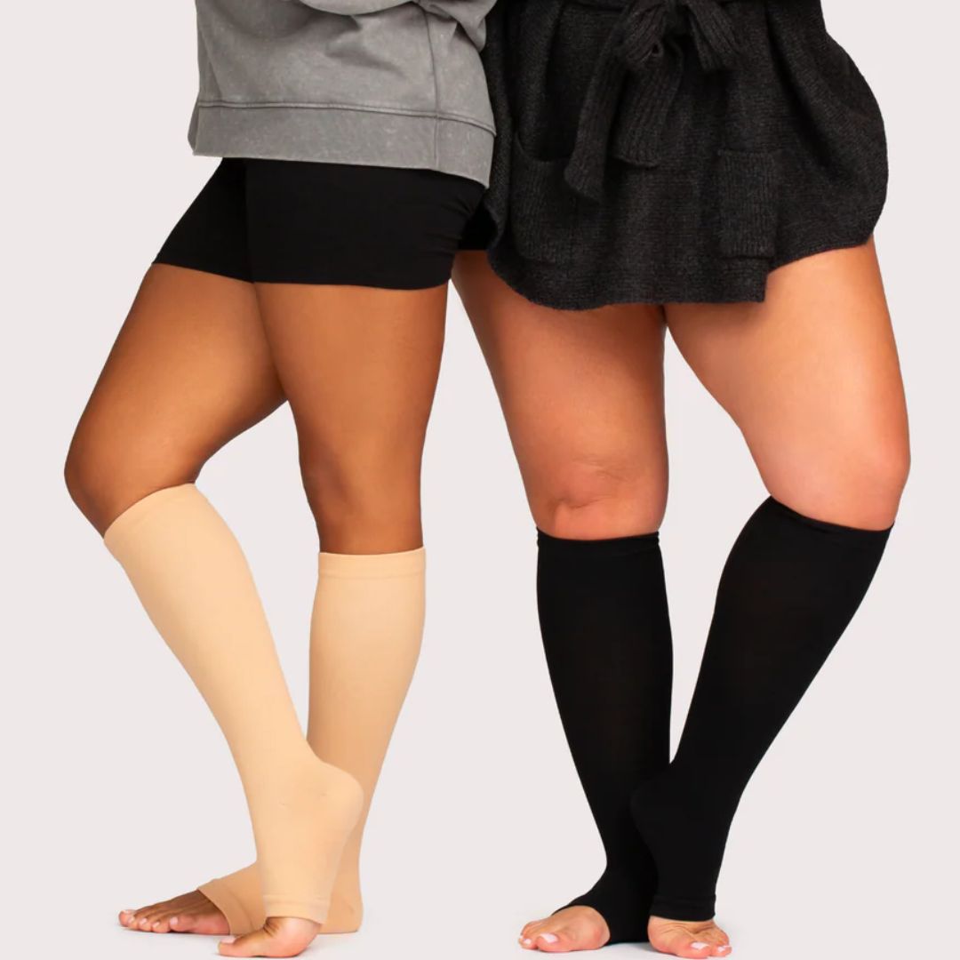Breathable open-toe compression socks in black and beige, worn up the calf
