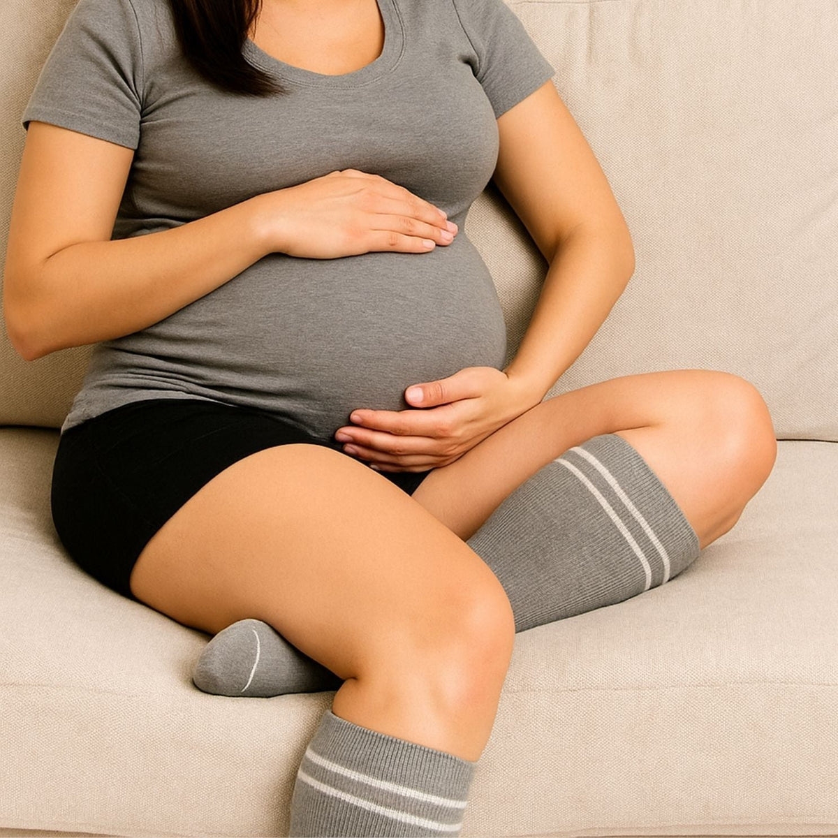 Pregnancy compression socks with gentle 15 to 20 mmHg support, worn up to the knee