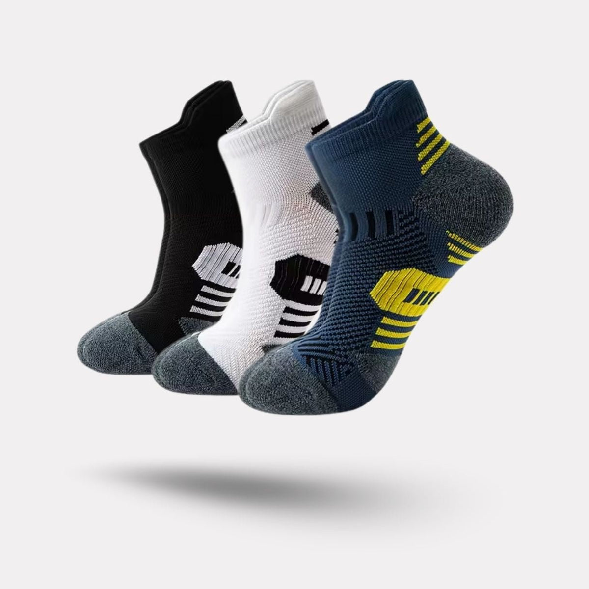 Three pairs of navy sport socks with reinforced heel and toe panels