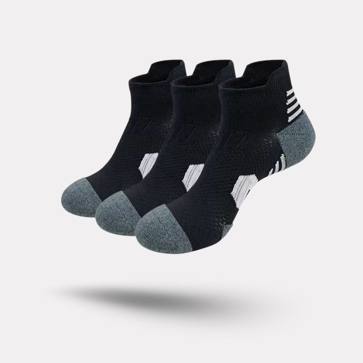 Three pairs of navy sport socks with reinforced heel and toe panels