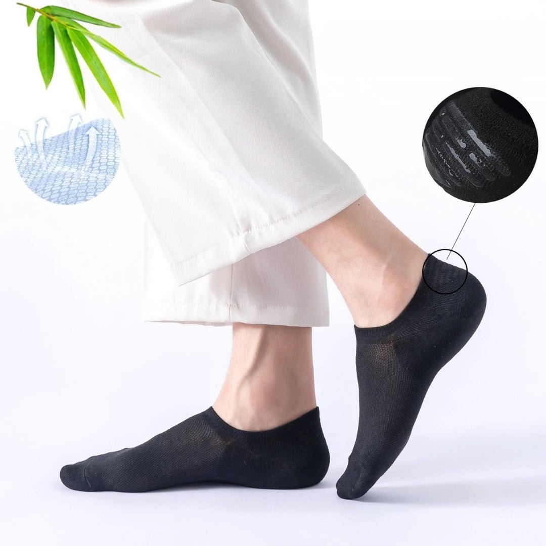 Pair of white bamboo fiber socks knitted to keep the foot dry