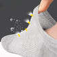 Pair of white bamboo fiber socks knitted to keep the foot dry