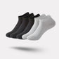 Five pairs of soft bamboo fiber socks in black and gray, worn up to mid-calf