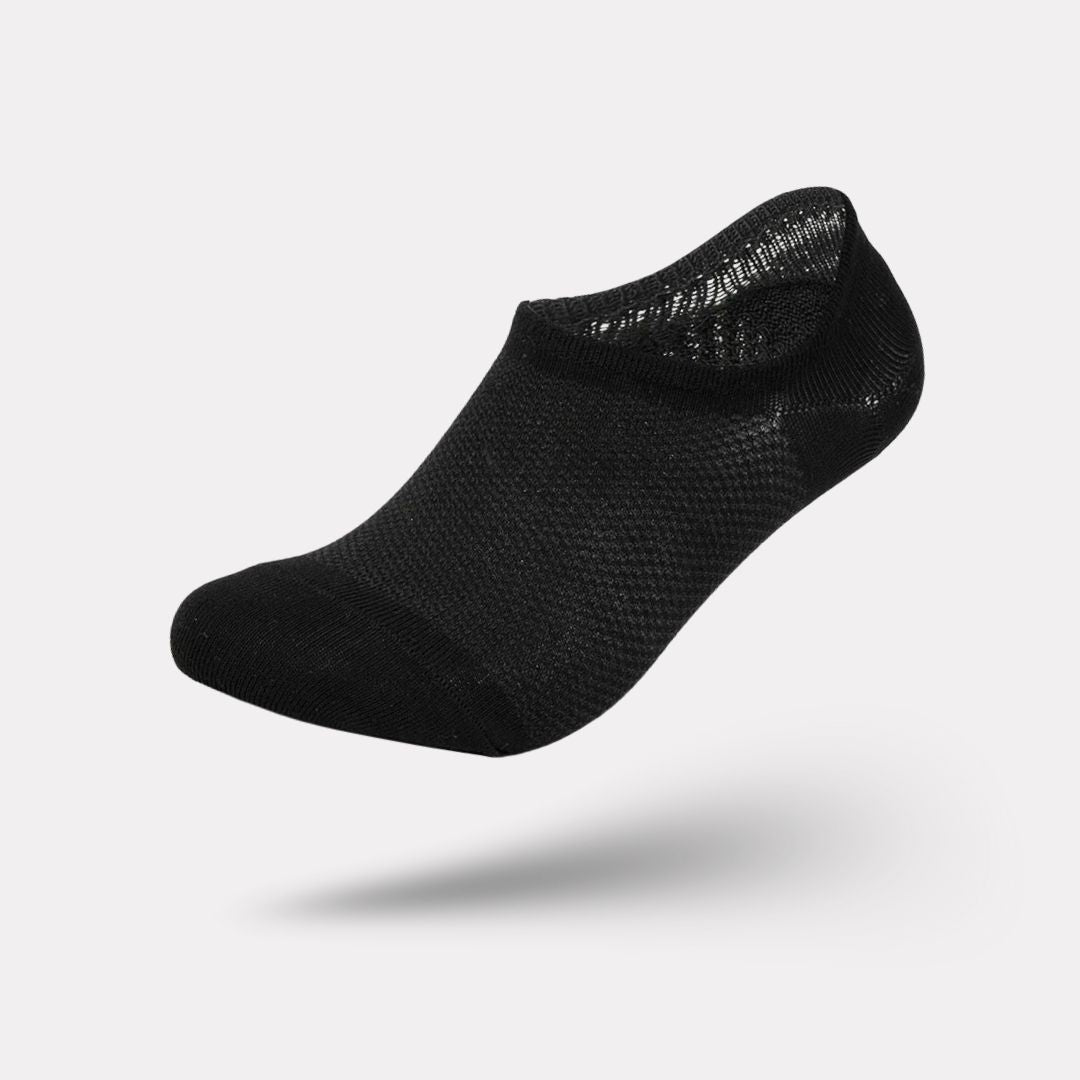 Thin bamboo fiber socks in black, white and mixed colors, sitting just above the ankle