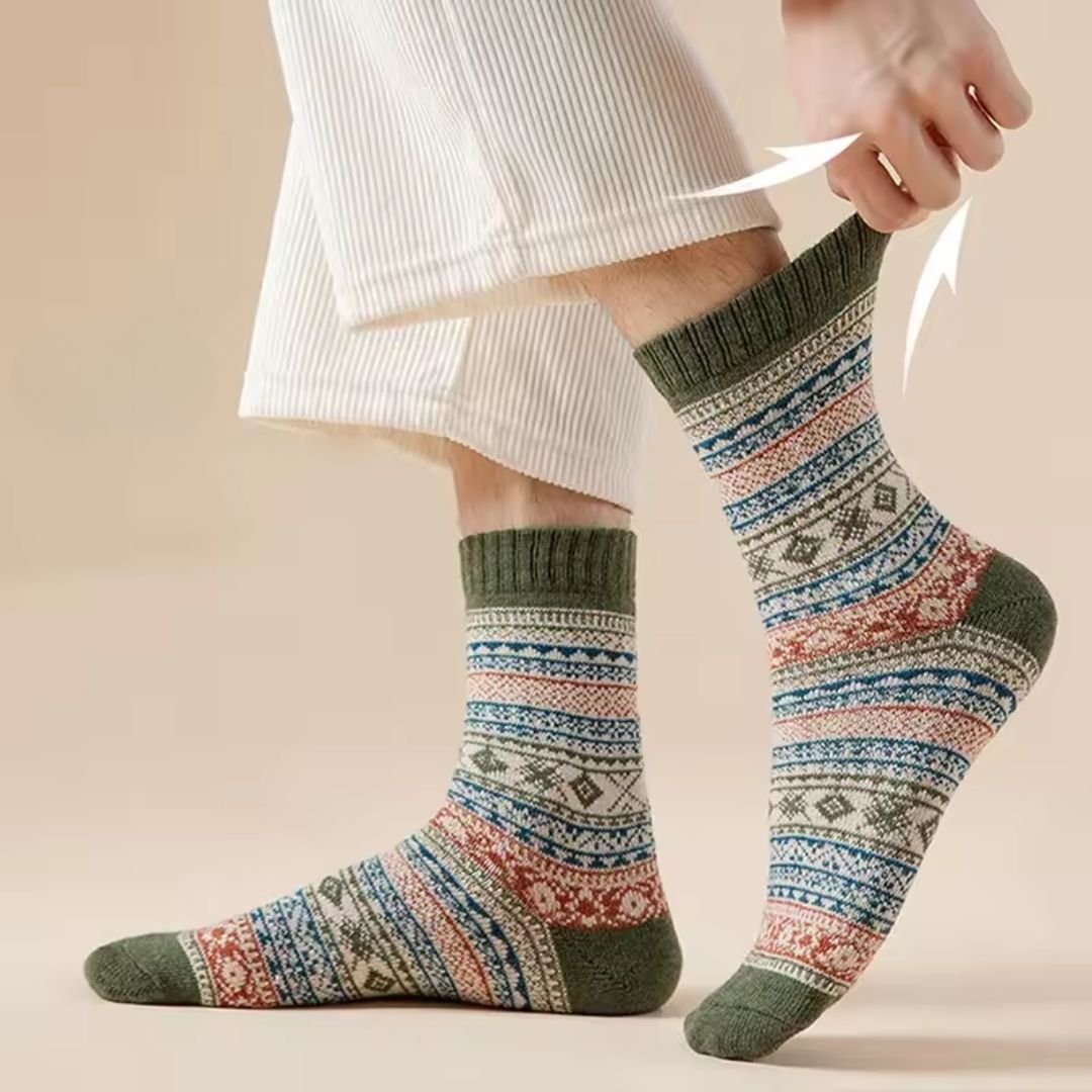 Four pairs of thick wool socks knitted to sit mid-calf for winter warmth