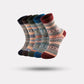 Four pairs of thick wool socks knitted to sit mid-calf for winter warmth