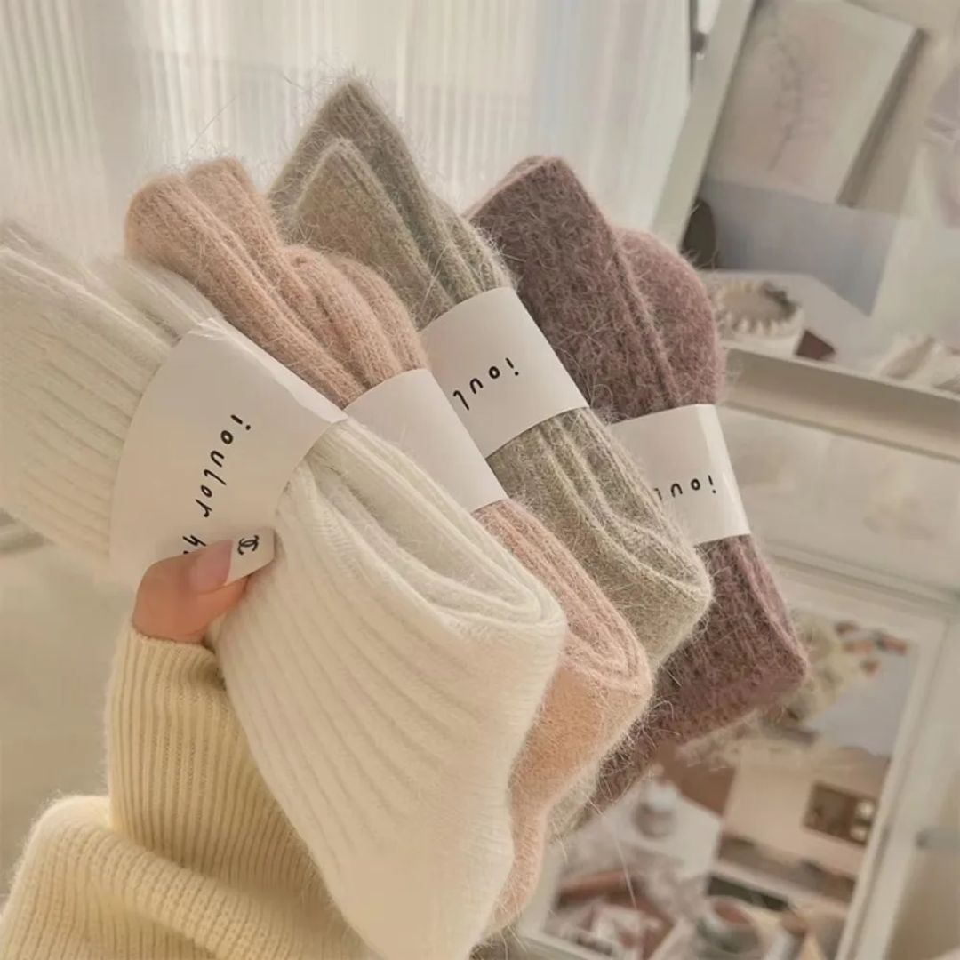 Soft wool socks for women in gray, purple, pink, black and white, sold in packs of three