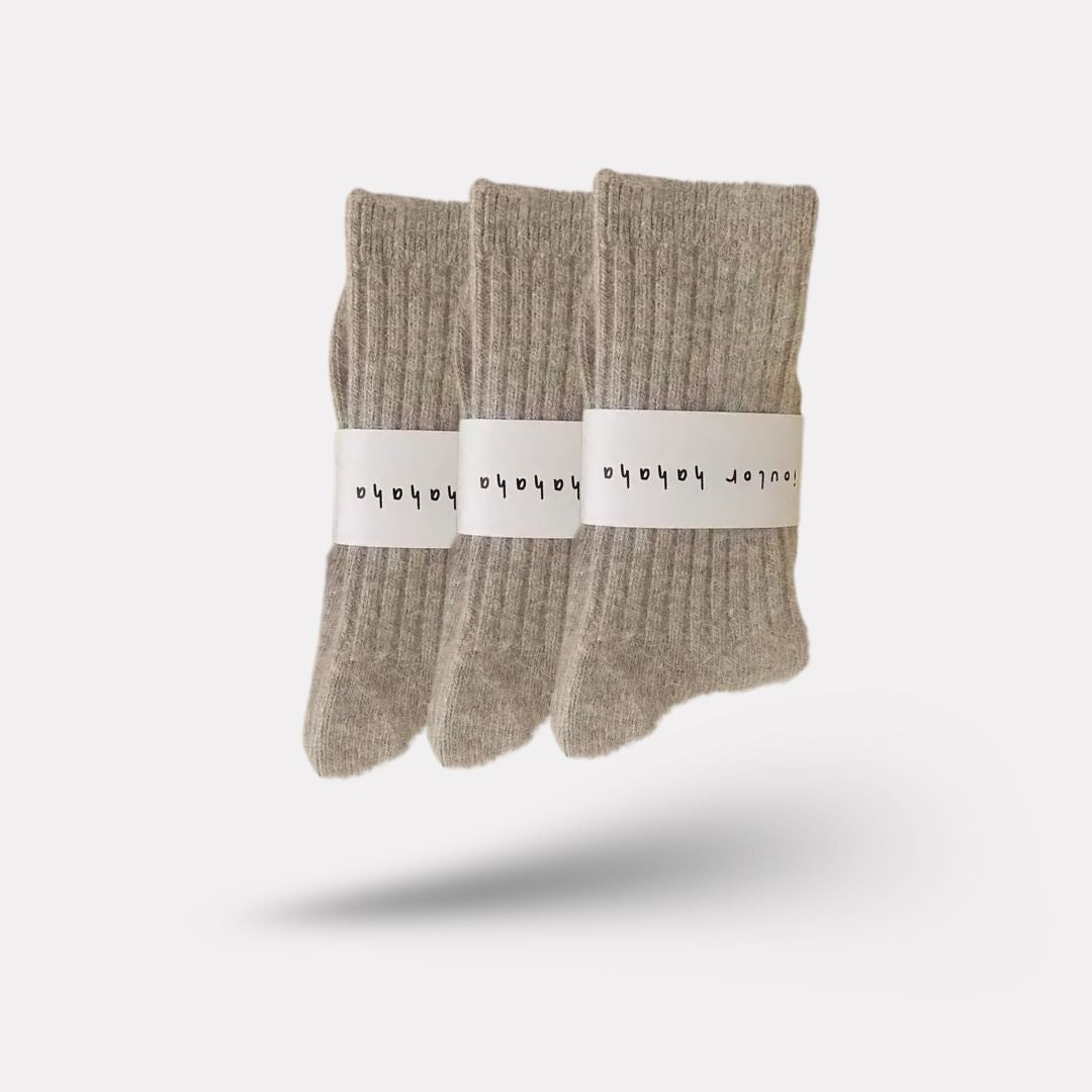 Soft wool socks for women in gray, purple, pink, black and white, sold in packs of three