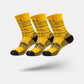 Merino wool sport socks in black, beige and yellow with a cushioned sole and ribbed cuff