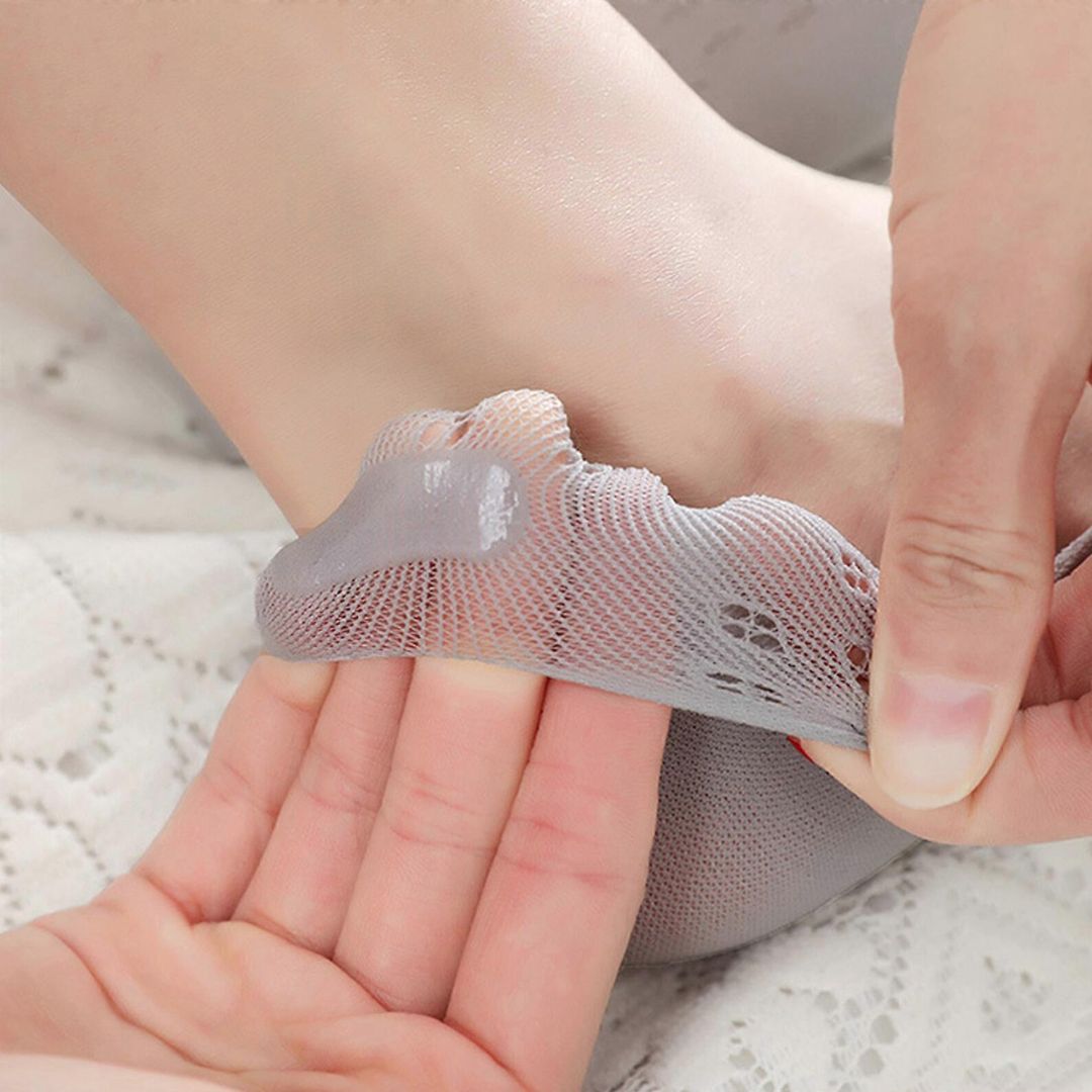 Orthopedic compression socks worn up the calf, in nude, white, gray and pink