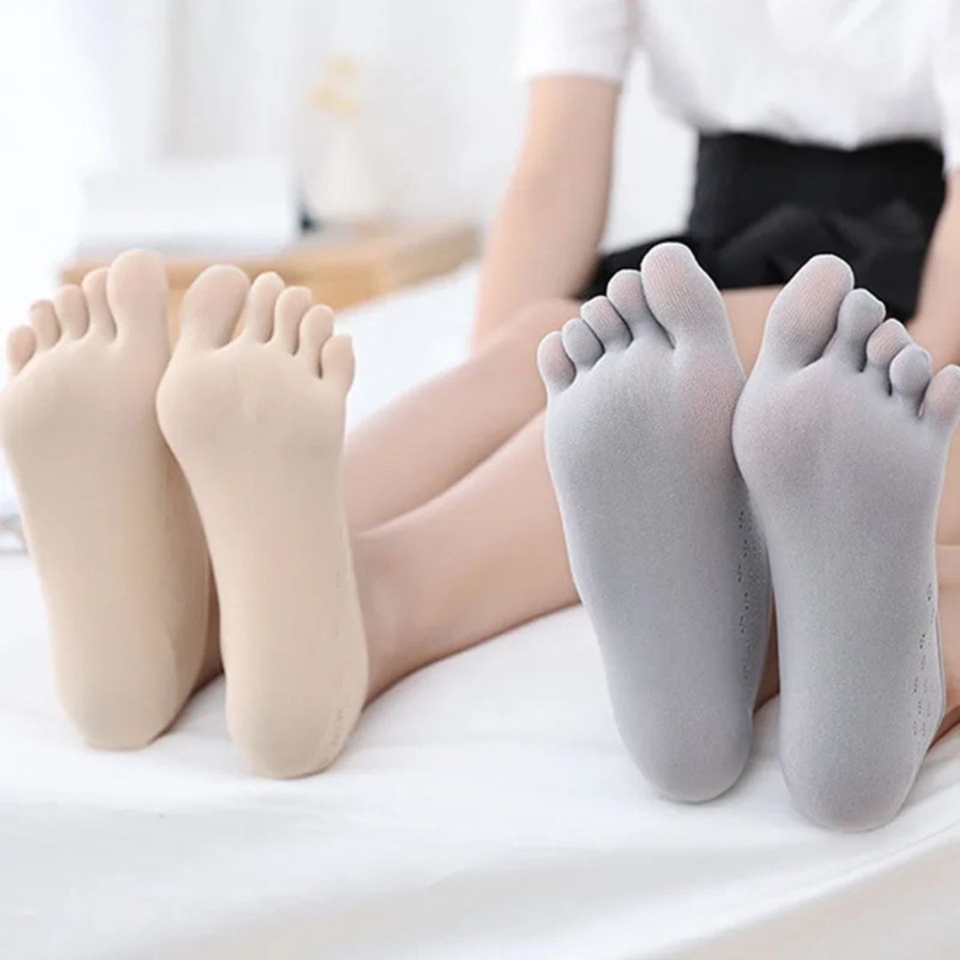Orthopedic compression socks worn up the calf, in nude, white, gray and pink