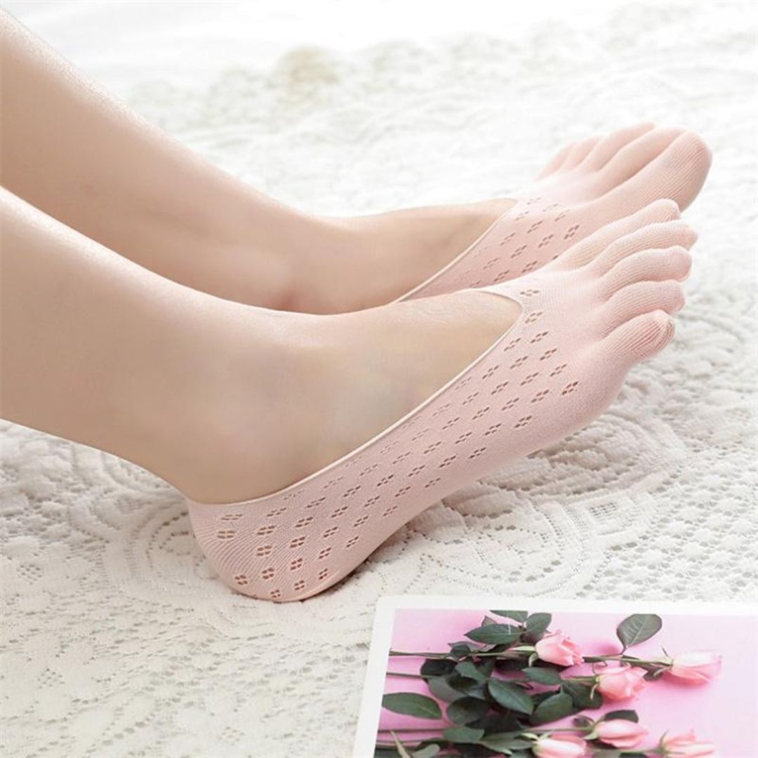 Orthopedic compression socks worn up the calf, in nude, white, gray and pink