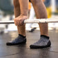 Minimalist barefoot shoes with a thin flexible sole, in red, black, green and gray