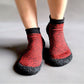 Minimalist barefoot shoes with a thin flexible sole, in red, black, green and gray