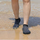 Minimalist barefoot shoes with a thin flexible sole, in red, black, green and gray