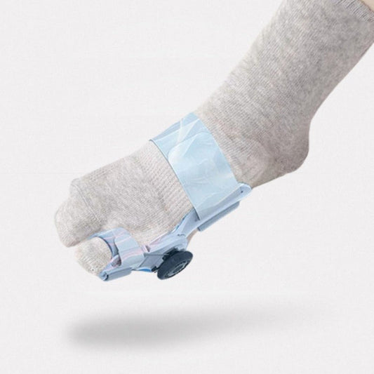 Gray, black and white socks shaped to fit around a bunion corrector on the big toe