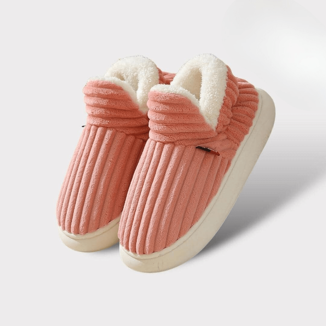 Winter slippers with a padded upper and a supportive sole, in green, pink and blue
