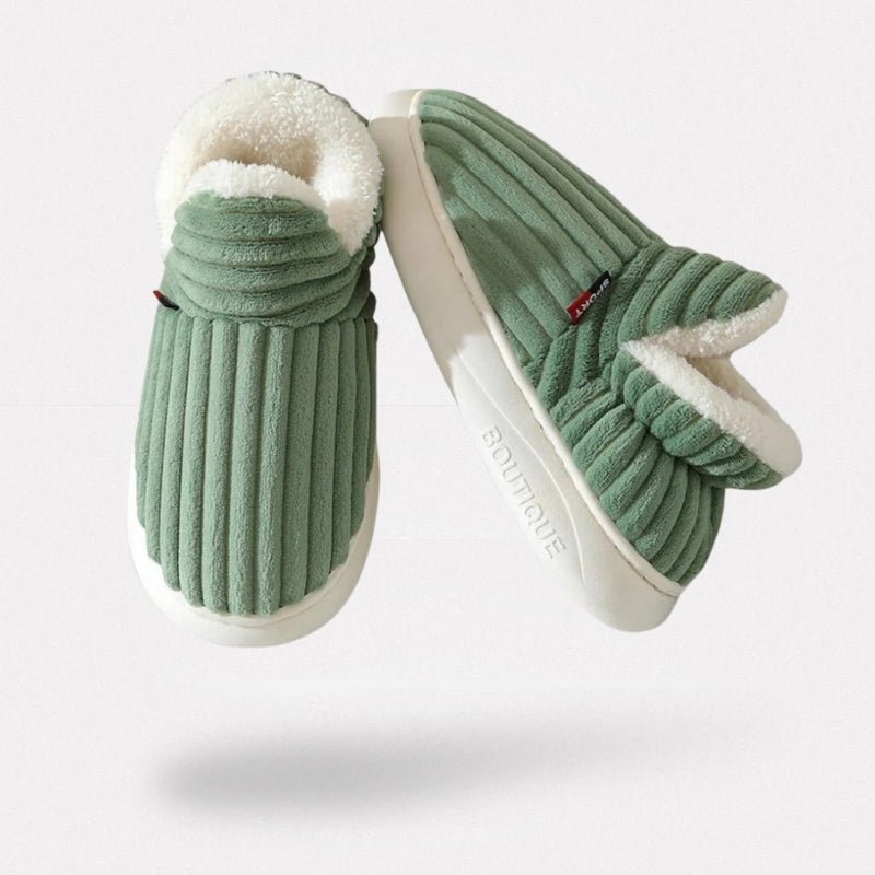 Winter slippers with a padded upper and a supportive sole, in green, pink and blue