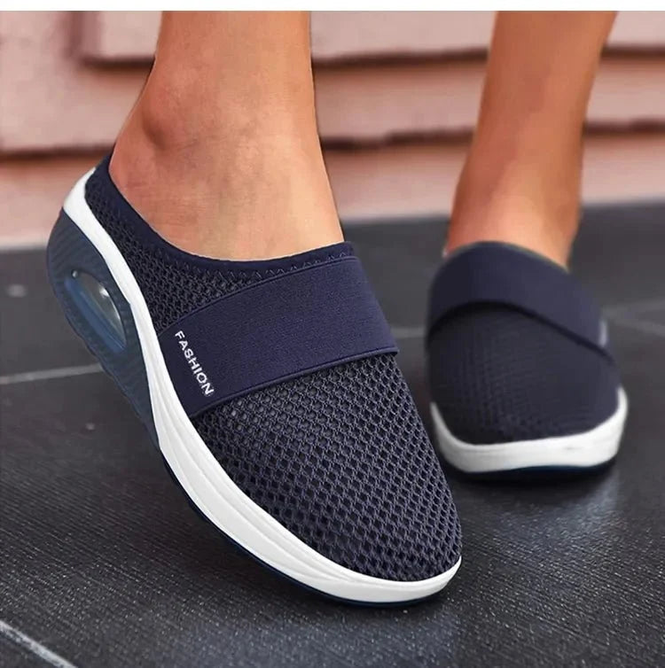 Orthopedic wedge slippers with a raised heel and open toe, in deep blue, gray, black and pink