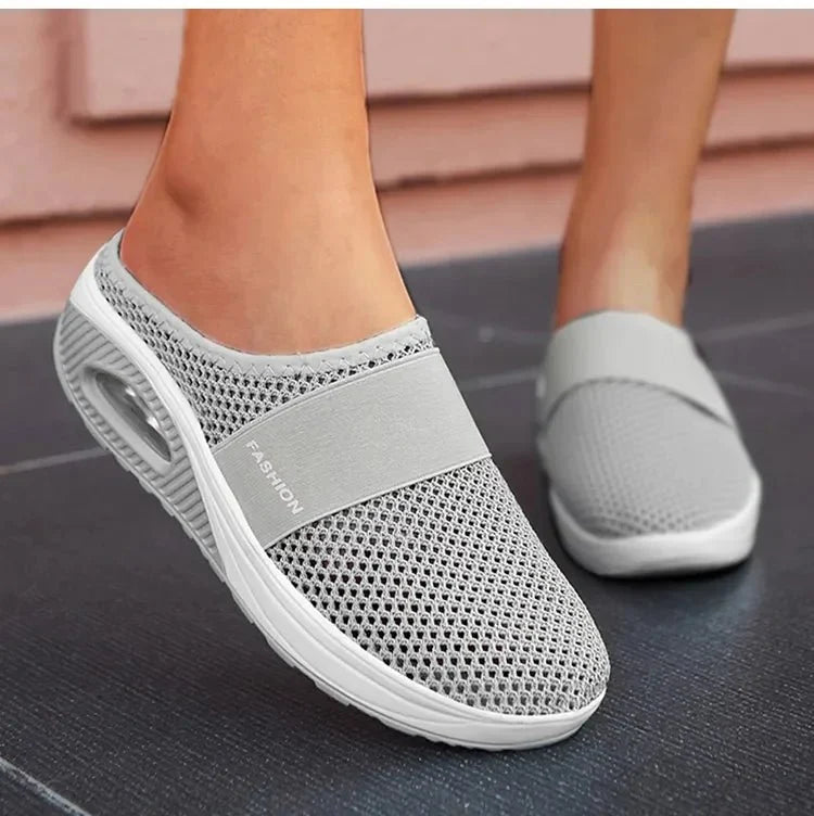 Orthopedic wedge slippers with a raised heel and open toe, in deep blue, gray, black and pink