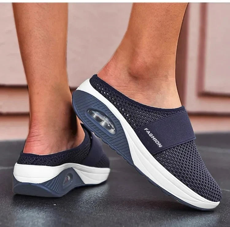 Orthopedic wedge slippers with a raised heel and open toe, in deep blue, gray, black and pink