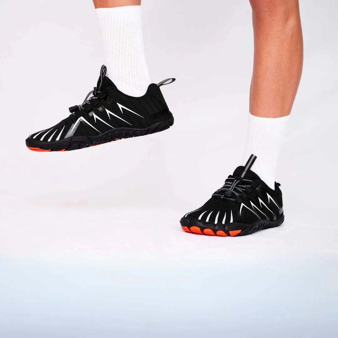 Barefoot sneakers with a thin flexible sole and wide toe box, in black, gray, green and red